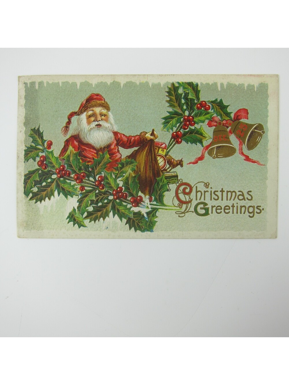 Vintage Christmas Postcard Santa Toys Mistletoe Holly Berries Embossed Antique